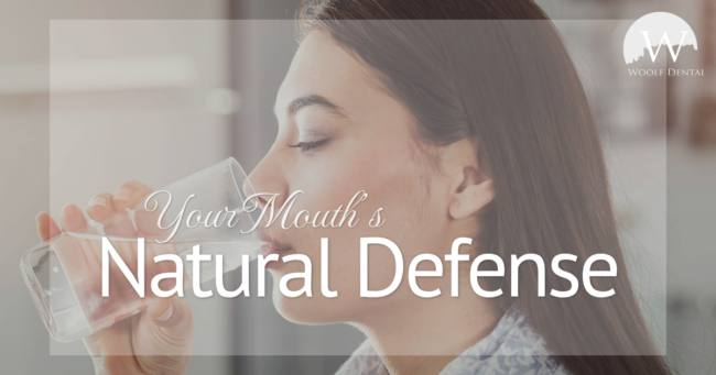 Your Mouth’s Natural Defense woman drinking a glass of water